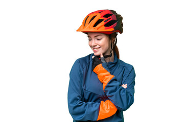 Young cyclist woman over isolated chroma key background looking to the side - obrazy, fototapety, plakaty