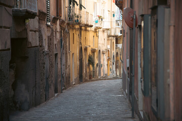 Fototapeta na wymiar Colorful houses and tiny narrow streets on Procida Island, Italy.