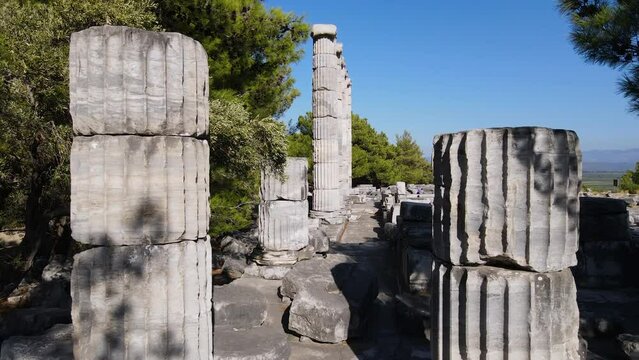 View of historical ruins, columns, ancient theater and temples in the ancient city of Priene.