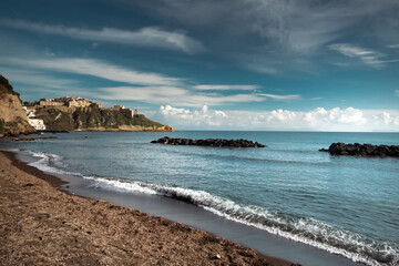 Panorama of the Corricella bay from the shore of the Chiaia beach