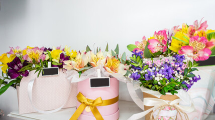 Flower shop window, flower arrangement in a box, bouquets. Concept: flower shop. small business. Floristics. delivery of flowers and gifts. holiday, nobody. Birthday. Showcase.Wallpaper