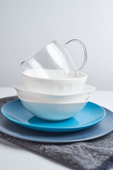Fototapeta na wymiar Clean dish plate on napkin. Dishwashing concept