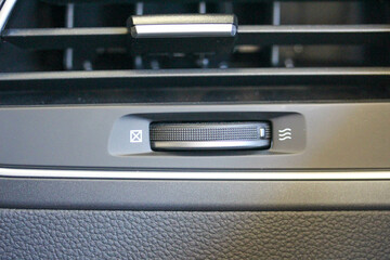 Obraz premium Close up of a new vehicle cabin air vent