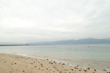 Lombok and Gili Air islands, overcast, cloudy day, sky and sea. Sunny day, sand beach.