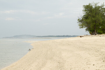 Fototapeta na wymiar Lombok and Gili Air islands, overcast, cloudy day, sky and sea. Sunny day, sand beach.