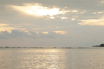 Lombok and Gili Air islands, overcast, cloudy day, sky and sea. Sunset, sand beach.