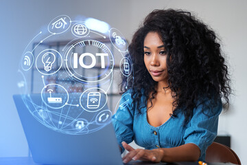 African woman using computer IOT hud, machine learning