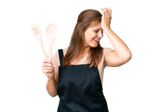 Middle age caucasian woman holding a rolling pin over isolated background has realized something and intending the solution