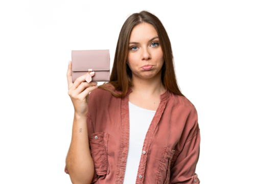 Young blonde woman holding a wallet over isolated chroma key background with sad expression