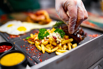 Professional chef cooking food in the kitchen restaurant 