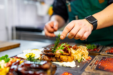 Professional chef cooking food in the kitchen restaurant 