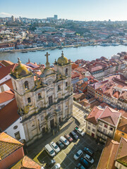 Aerial view of colorful Porto's city center with Douro river from Igreja dos Grilos (Church)