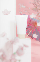 3d rendering A foam tube cosmetic mockup with a Japanese pink theme with cherry blossoms floating around the product.