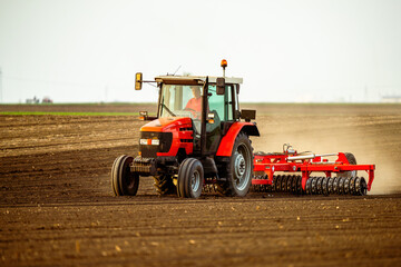 The heartbeat of the farm, tractor preparing the fields for a new cycle of life