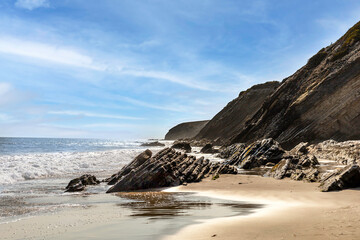 Fototapeta na wymiar Rock formations by the ocean