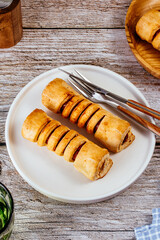 homemade sausage in dough in a plate