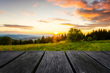 Empty wooden table with beautiful landscape background