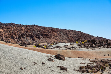 Landscape of sand and volcanic mountains in the  canary islands