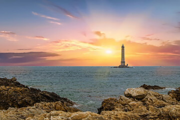 Auderville. Goury. Coucher de soleil sur le phare de La Hague .  Manche. Normandie