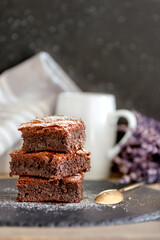 Dark chocolate brownies stack, lavender flowers
