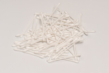 Group of white cotton buds isolated on white background.