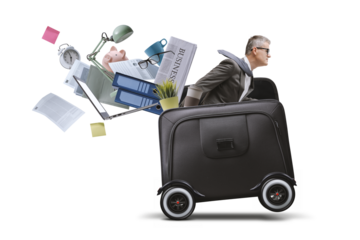 Businessman riding a briefcase with wheels