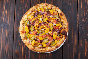 pizza on the wooden background
