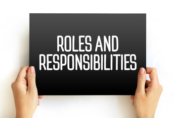 Roles And Responsibilities text on card, concept background