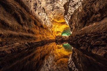 Lanzarote Green Caves, Cueva de los Verdes, underground lake with amazing water reflections. High quality photo