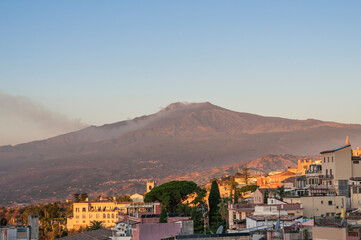 View of Mount Etna from the city of Taormina / View of Mount Etna volcano in the morning, from the city of Taormina on the island of Sicily, Italy. - 571186940