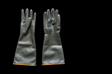 Rubber working gloves waterproof. Long protective industrial gloves, protect from oil, acid and alkaline solutions, chemical substances and hydrocarbons, isolated on black background