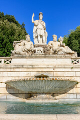 Fototapeta na wymiar Fountain on Piazza del Popolo square in Rome, Italy