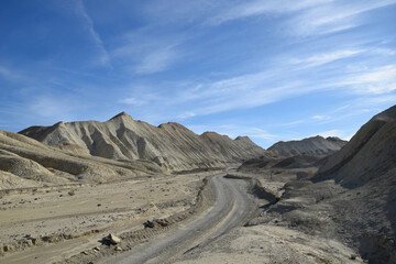 Fototapeta na wymiar Landscape in the Death Valley National Park: mountain road in the Twenty Mules Team Canyon