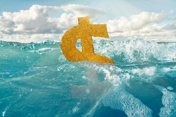 The golden dollar sign sinks in water. Background on the theme of the bankruptcy of the hotel...