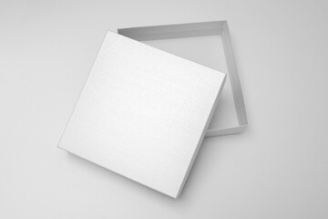 White textured opened box, gift mockup on white background.High resolution photo. Blank White Product Package Box Mock-up. Container, Packaging Template on white. Cardboard box.