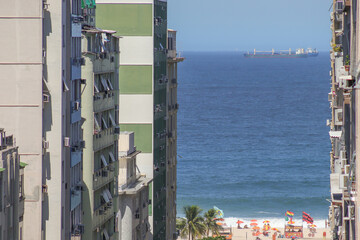 Copacabana beach between buildings