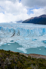 The famous glacier and natural sight Perito Moreno with the icy waters of Lago Argentino in Patagonia, Argentina, South America 