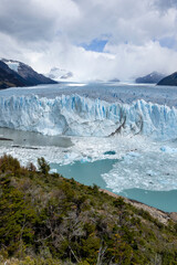 The famous glacier and natural sight Perito Moreno with the icy waters of Lago Argentino in Patagonia, Argentina, South America 