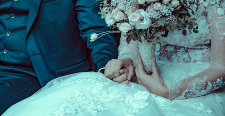Robe de mariage et bouquet de la mariée