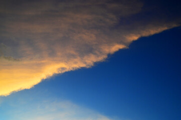 Naklejka na ściany i meble Blue sky and clouds. Sunset view