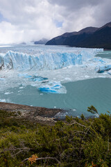 The famous glacier and natural sight Perito Moreno with the icy waters of Lago Argentino in Patagonia, Argentina, South America 