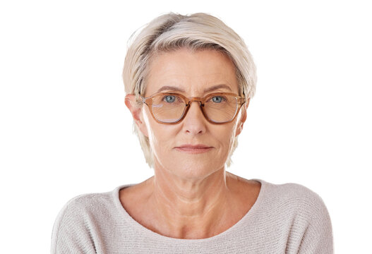 A mature caucasian woman wearing trendy brown prescription spectacles. Senior female looking serious wearing reading glasses for better eyesight isolated on a png background.