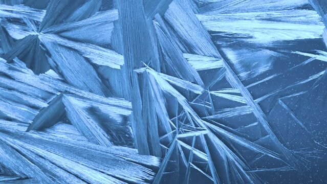 Window glass freezing process tapse lapse. Christmas background with frozen pattern on window glass. UHD 4k video