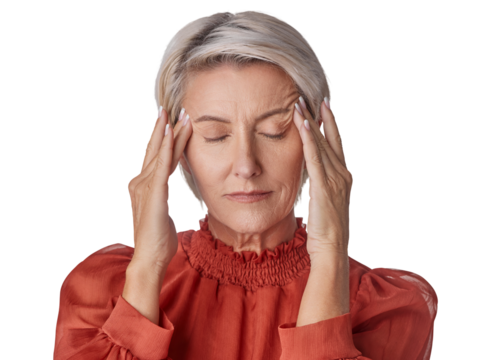 A mature woman suffering from stress or a headache grimacing in pain as she holds his head isolated on a png background.