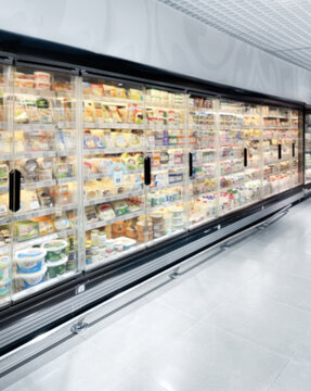 choosing a dairy products at supermarket.frozen food from a supermarket freezer