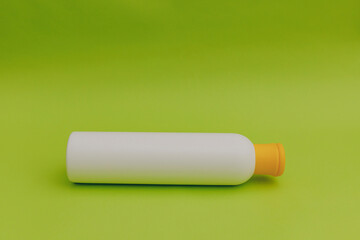 Shampoo for dogs on a green background