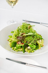 green salad on the white plate