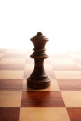 chess piece of the Queen on the chessboard
