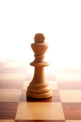 chess piece of the King on the chessboard