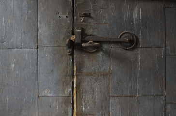 Closeup of. an abandoned, grungy closet lock